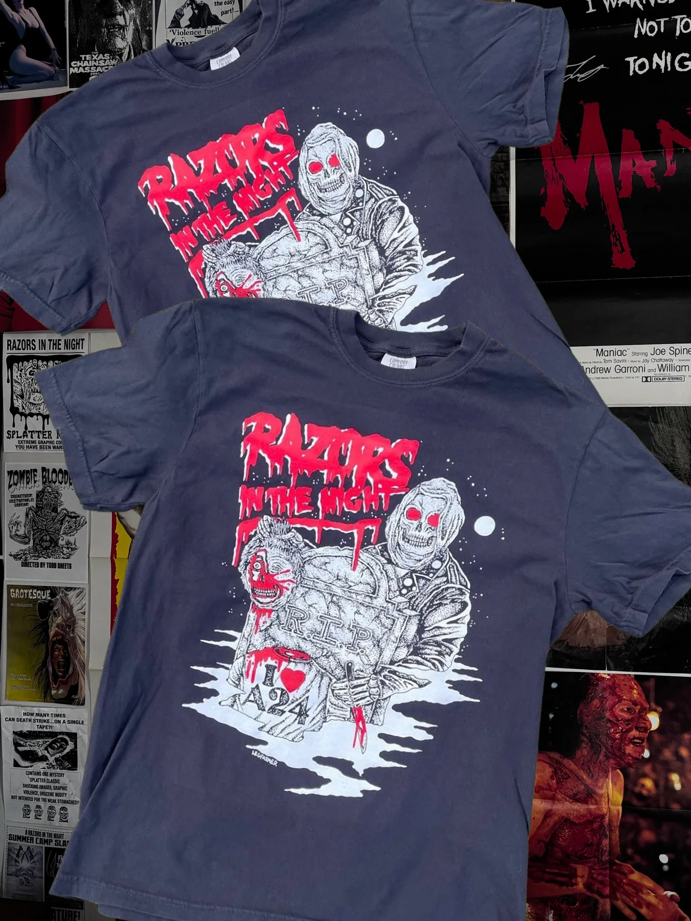Razors in the Night horror shirt photographed on a wall of posters